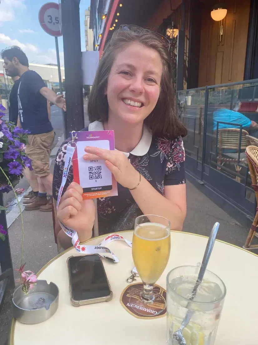 One of the first STYLY users holding a VivaTech badge printed with STYLY