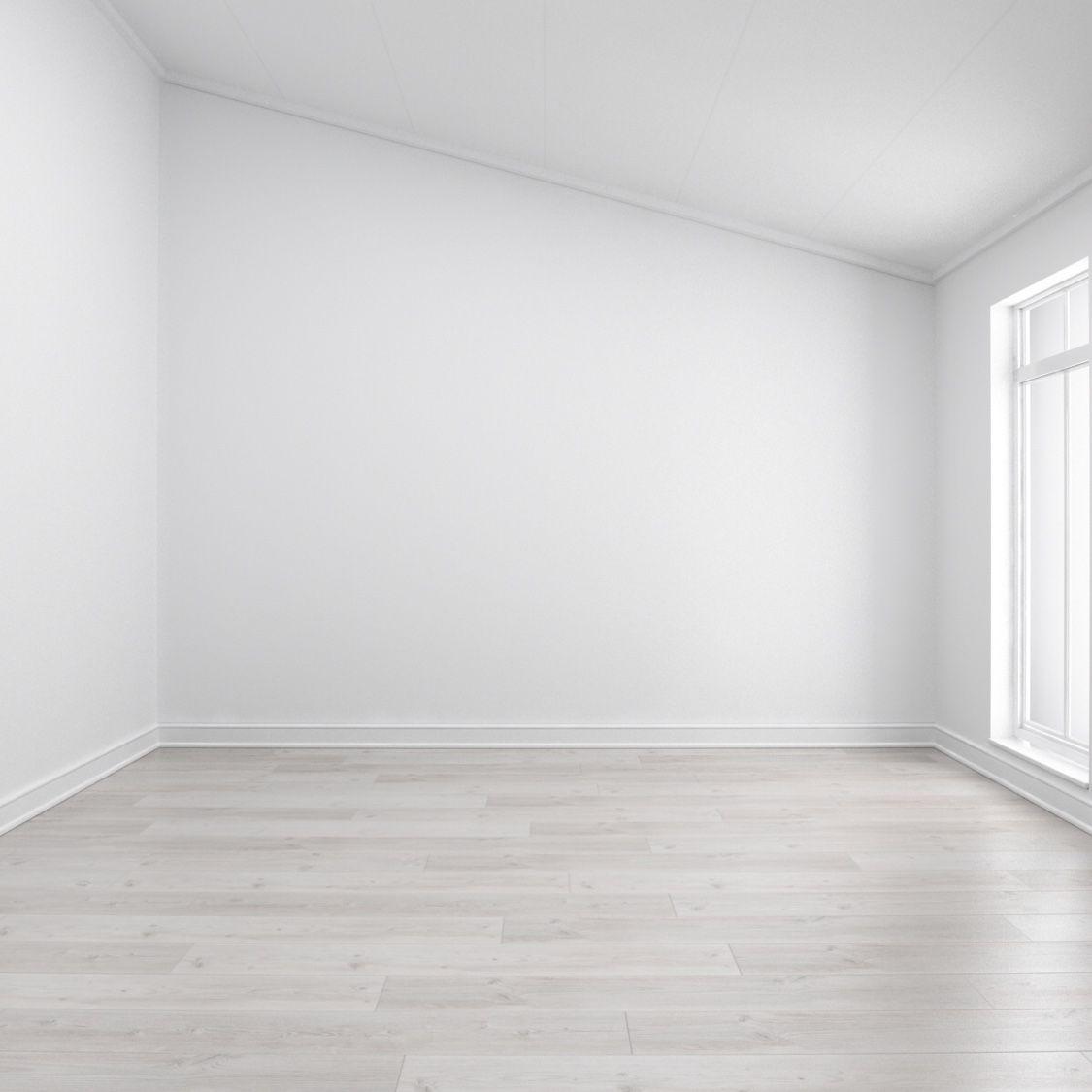 A real Paris living room photographed from the doorway at chest height, ready to upload to an AI interior design tool